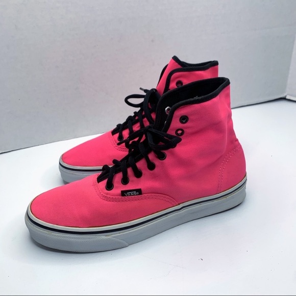 pink and black high top vans